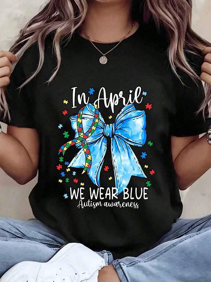 Designed For Modern, Stylish, And Comfortable Women. T-Shirt With A Blue Ribbon Print For April Awareness. Crew Neck, Short Sleeves, Casual Style. A Perfect Gift For Her. 220g. Made With Premium Soft And Breathable Fabric, Designed For All-Day Comfort And Versatile Everyday Wear, Perfect For Casual Outings. - 黑色 - 查看 1
