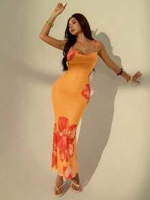 Vestido con tirantes de escote bajo y estampado floral rosa para estilizar la figura de mujer.Conjunto elegante y sexy para las vacaciones de verano - Naranja - Ver 9