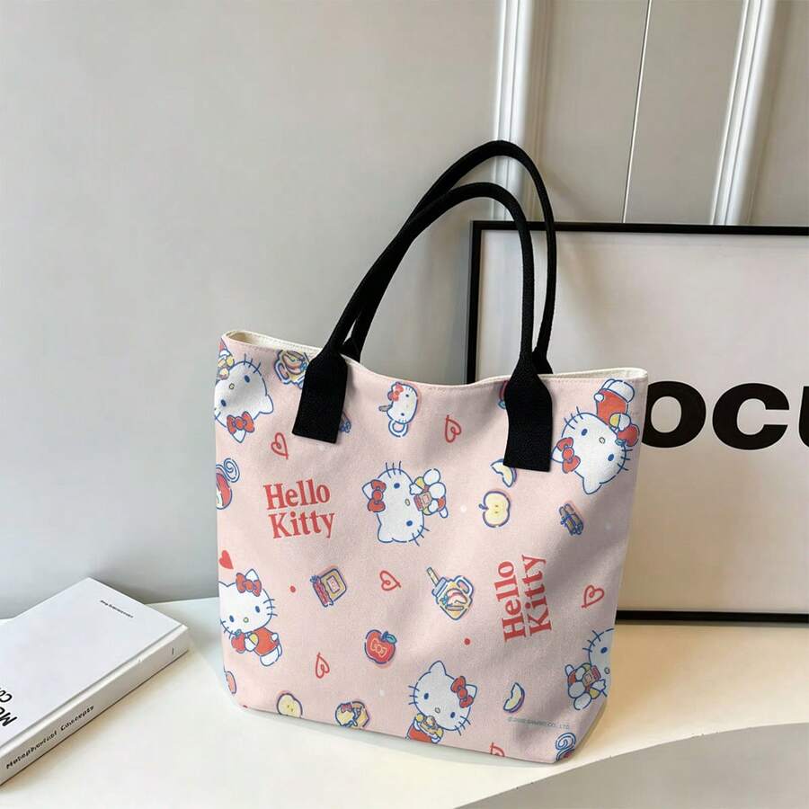 Miniso Sanrio Hello Kitty 全印花帆布手提包,粉色,饰有食物和爱心图案,适合日常使用。 - 黑色 - 查看 1