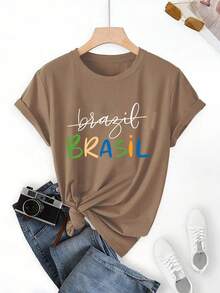 Corte regular, estampado estilo brasileño, colores brillantes, diseño único. Camiseta deportiva de moda para mujer con estampado único, cuello redondo y manga corta, cómoda para el uso diario casual de verano. - Negro - Ver 9