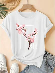 Primavera/Verano 2026: Nueva Camiseta de Manga Corta con Cuello Redondo para Mujer, con Estampado Artístico de Ramas de Flor de Cerezo, Estilo Vintage Desgastado, Top Casual, Tejido de Punto Suave, Ropa de Alta Calidad para Mujer. |   Diseño Divertido y Peculiar |   Adecuado para uso diario en primavera, verano y otoño. |   Top divertido y rejuvenecedor - Blanco - Ver 1