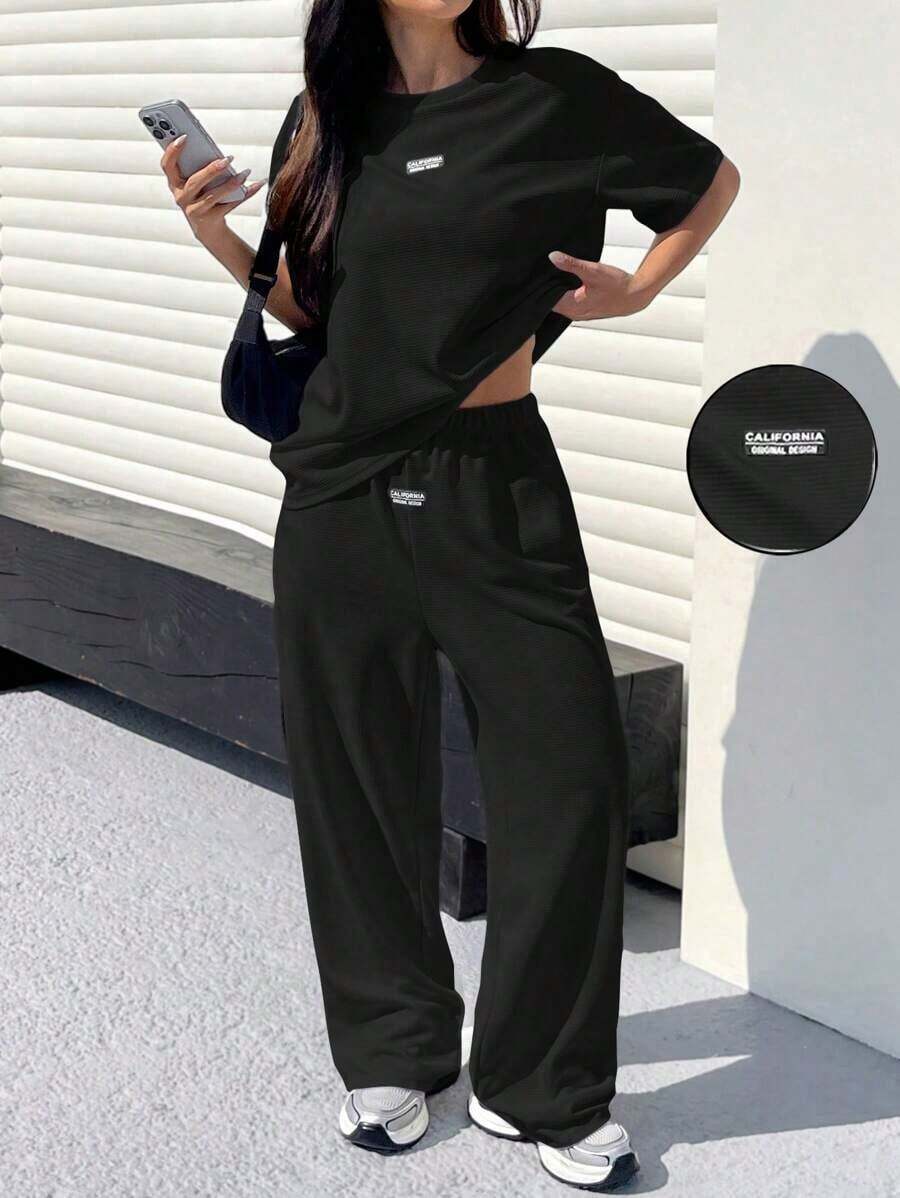 Conjunto informal de camiseta holgada y pantalones con textura mostaza para mujer - Negro - Ver 1