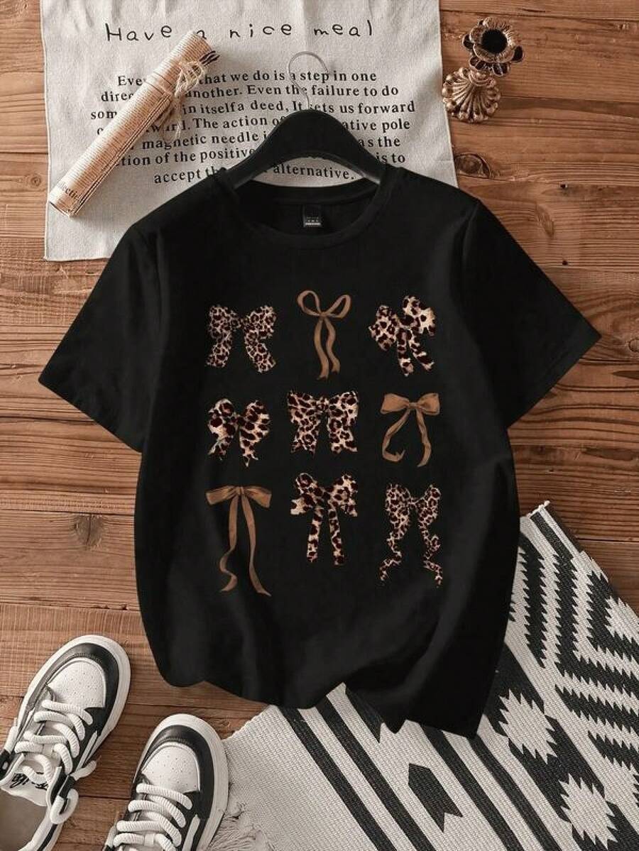 New 2026 Playera mujer estilo casual juvenil lazos creativos estampado leopardo poliéster negro ajuste holgado cuello redondo manga corta primavera verano uso diario camiseta - Negro - Ver 1
