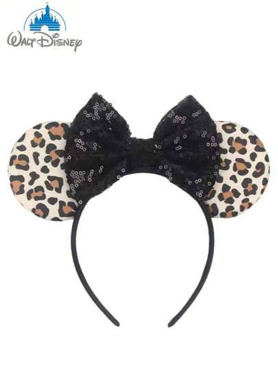  Băng đô tai Minnie in họa tiết da báo thời trang của Disney, gồm một chiếc nơ in họa tiết da báo kết hợp với tai Minnie lấp lánh, một phụ kiện tóc hình nơ Minnie hoạt hình và phụ kiện hóa trang - hoàn hảo cho các bữa tiệc ở trường, tiệc hóa trang, nhập vai và công viên giải trí - là món quà hoàn hảo cho mọi dịp.