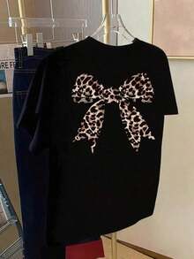 Camiseta de manga corta de talla grande para mujer - Camiseta básica casual de corte holgado, elegantes tops de poliéster, camiseta de manga corta con lazo y estampado de leopardo - Camiseta estampada de primavera/verano para mujer, artículo de moda transpirable y cómodo. - Negro - Ver 2