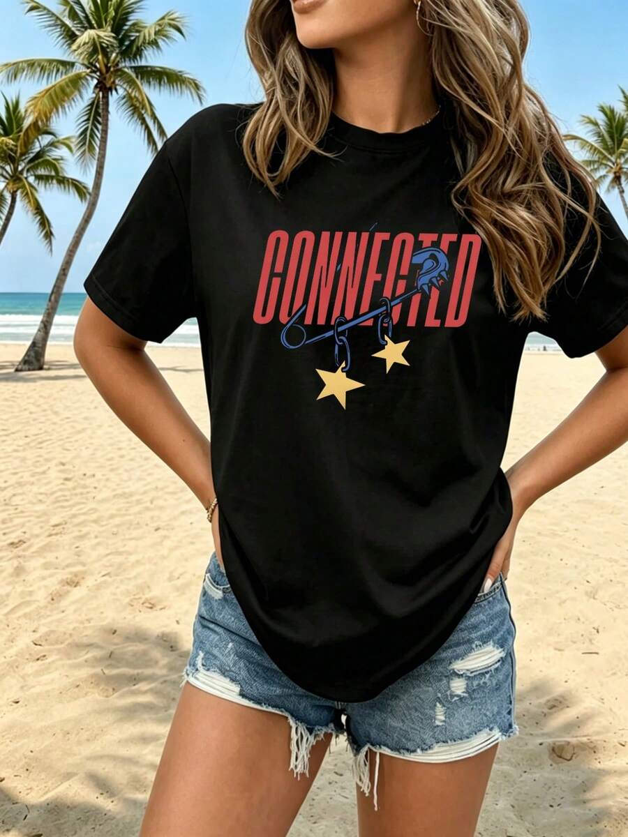 Camiseta de mujer 2026, nueva de verano, con cuello redondo y estampado temático conectado, con diseños de cadenas y estrellas, confeccionada en tela de seda de leche doblemente perchada, cómoda y transpirable, versátil para el uso diario, adecuada para ir al trabajo y ocasiones informales, con efecto adelgazante, disponible en múltiples colores. - Negro - Ver 1