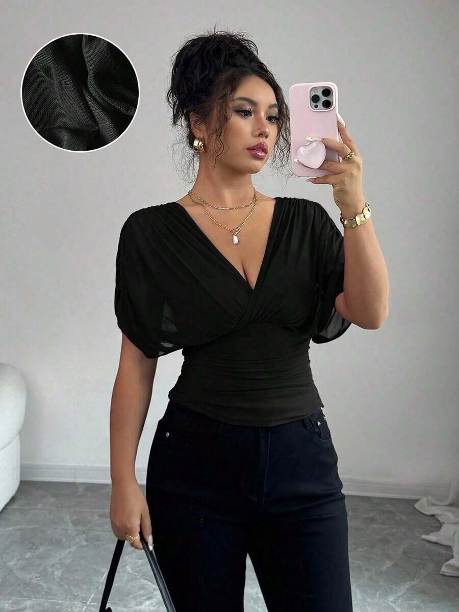 Camiseta con manga de hombro fruncida, elástica, de tela con forro de malla elegante para vacaciones, playa y uso casual, de estilo romántico francés, con dobladillo con volantes, adecuada para uso al aire libre y para el día a día, para primavera/verano - Negro - Ver 1