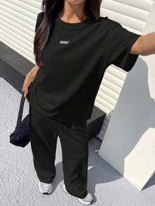 Conjunto informal de camiseta holgada y pantalones con textura mostaza para mujer - Negro - Ver 3