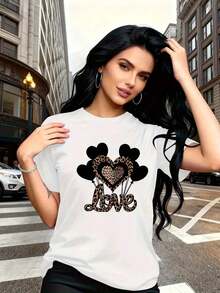 This 1pc Top Combines Boldness And Delicacy With A Modern Black Balloon Print And Leopard-Print Hearts. The Simple, Casual, And Versatile Women's Short-Sleeved Crew Neck T-Shirt Is Perfect For Casual Travel And Vacations. It's A , Unisex, Loose-Fitting, Urban Vintage-Style Cotton T-Shirt With A Crew Neck. - 白色 - 查看 2