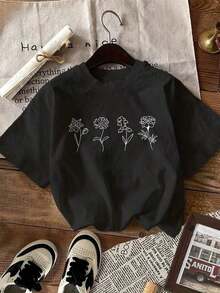 Camiseta Y2K de algodón negro con diseño minimalista de flores bordadas, perfecta para un look fresco y moderno. Ideal para quienes buscan estilo y comodidad en una sola prenda. ¡ única con esta pieza exclusiva! ropa de hombre - Estilo - Ver 8