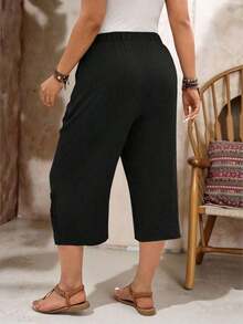Pantalones casuales capri de talla grande para mujer, de unicolor, con cintura anudada y bolsillos - Negro - Ver 2