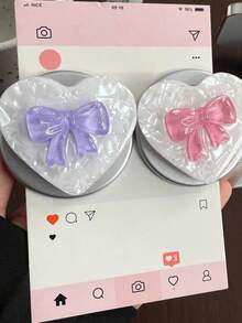 1个彩色果冻蝴蝶结磁吸弹出式支架——可伸缩、可折叠、便携的桌面支架，兼容苹果和安卓手机。它配有底座和磁环，可搭配任何手机壳使用。是送给女孩生日、节日或周年纪念日的理想礼物。 - 彩色 - 查看 3