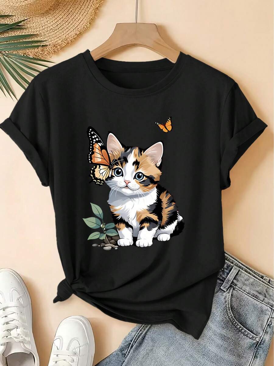 Camiseta de Mujer Primavera/Verano 2026, Nueva Camiseta de Manga Corta con Cuello Redondo para Mujer, con Estampado Interactivo de Tres Flores, Gato y Mariposa, Estilo Vintage Desgastado, Top Casual, Tejido de Punto Suave, Ropa de Mujer de Alta Calidad. | Diseño Divertido y Peculiar | Adecuado para uso diario en primavera, verano y otoño. | Top divertido y rejuvenecedor - Negro - Ver 1