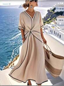 Vestido de mujer color albaricoque con detalles en contraste negro, escote en V, corte en la cintura con volantes, bolsillos laterales, tejido ligero ideal para verano, estilo casual elegante perfecto para vacaciones, playa y viajes, moda resort - Albaricoque - Ver 2