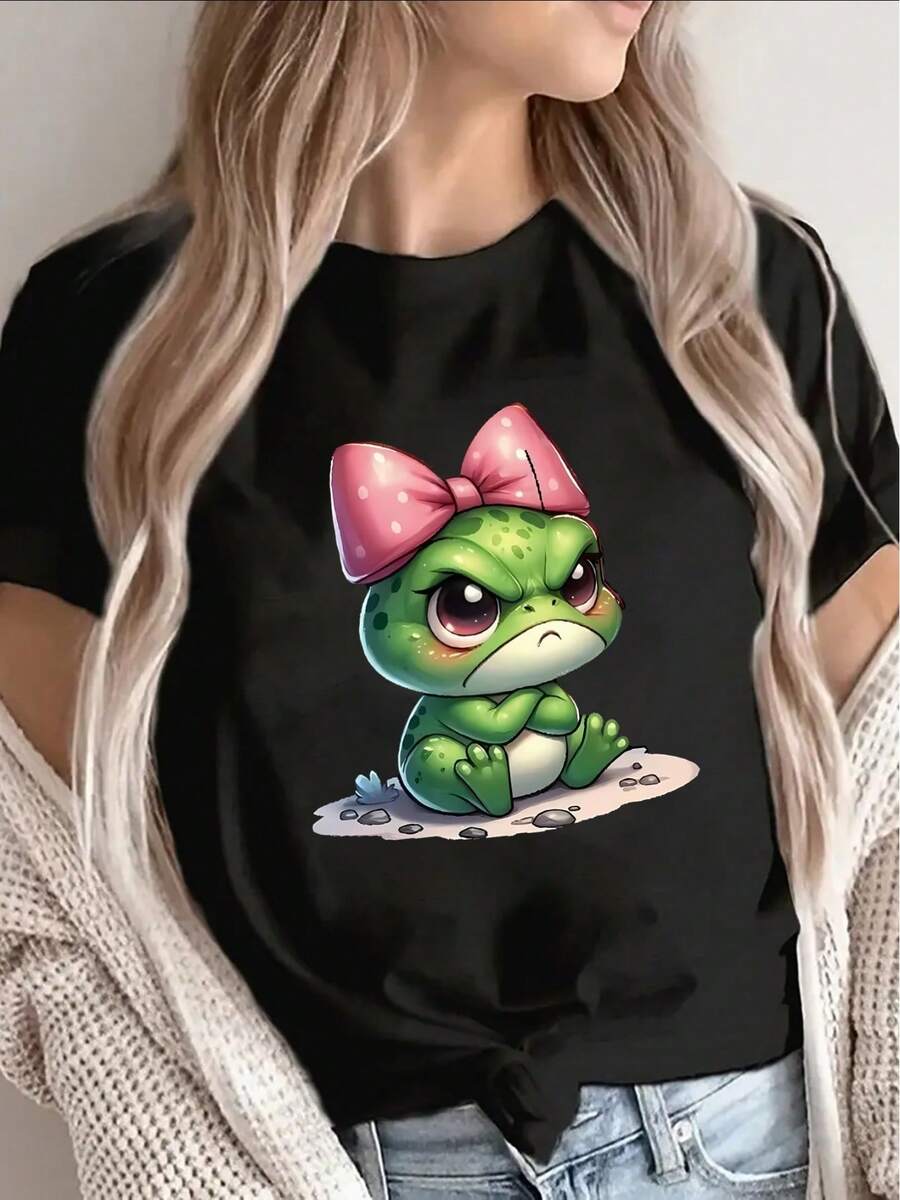 Camiseta de manga corta de poliéster para mujer, con un bonito estampado de rana verde y un lazo rosa, es ligera y cómoda, adecuada para uso casual en casa o al aire libre, y es una opción ideal para el uso diario en la sala de estar o en una cafetería. - Negro - Ver 1