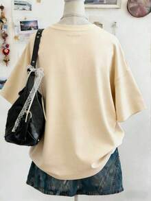 Camiseta de manga corta con cuello redondo y corte holgado para mujer, a la moda para el verano. - Albaricoque - Ver 2