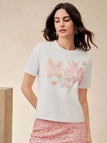 Elegante blusa de manga corta con diseño exclusivo, estampado de lentejuelas blancas, favorecedora para la figura femenina. - Blanco - Ver 7