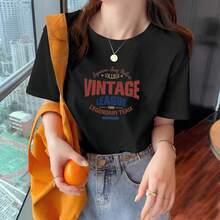 Camiseta de manga corta color albaricoque para mujer, nueva moda de verano, cuello redondo, corte holgado, efecto adelgazante, top para personas de complexión pequeña, camiseta cómoda y holgada, camisetas de moda. - Negro - Ver 1