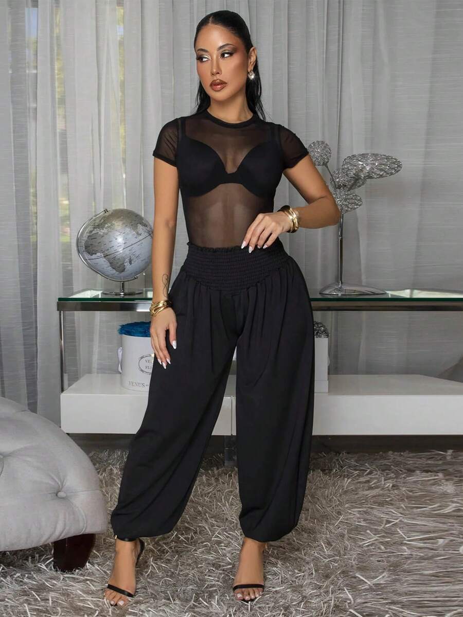 Comfortable Black Woven Fabric Jogger Pants For Women Stylish Cropped Length And Slouchy Fit - Black - View 1