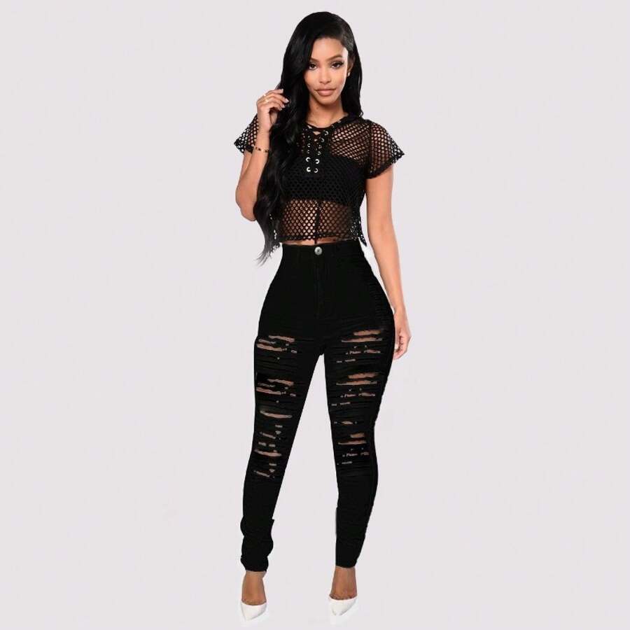Pantalones de mezclilla ajustados de cintura alta, elásticos, con diseño único de roturas y efecto desgastado. - Negro - Ver 1