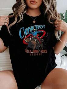 Short-Sleeve Blouse. Cute Cowboy Riding A Bull With A Red Background Symbolizing Strength, Freedom, And An Indomitable Spirit. Women's T-Shirt, 220g Cotton. Casual Blouses For Women. 100% Cotton. - 黑色 - 查看 5
