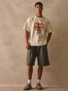 Camiseta de cuello redondo, de corte holgado, manga corta, hombros caídos, con estampado gráfico de un tocadiscos en la parte delantera, esencial para primavera y verano. - Albaricoque - Ver 5