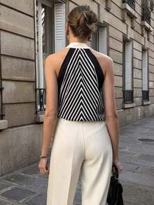 2026 Nuevo estilo urbano chic de verano, top sin mangas geométrico negro y albaricoque, tela de satén fluida, diseño de escote en V con cintura anudada, sensación de alta gama para ir y venir y uso casual, tela cómoda, camiseta de elegancia francesa para ir y venir y vacaciones, dobladillo elástico, lazo delantero, nueva camiseta de verano para mujer, top camiseta elegante - Multicolor - Ver 2