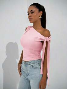 Blusa elegante de mujer con cuello asimétrico y hombro oblicuo con lazo, adecuada para uso diario, citas, salidas, discoteca, fiestas y reuniones - Rosa coral - Ver 4