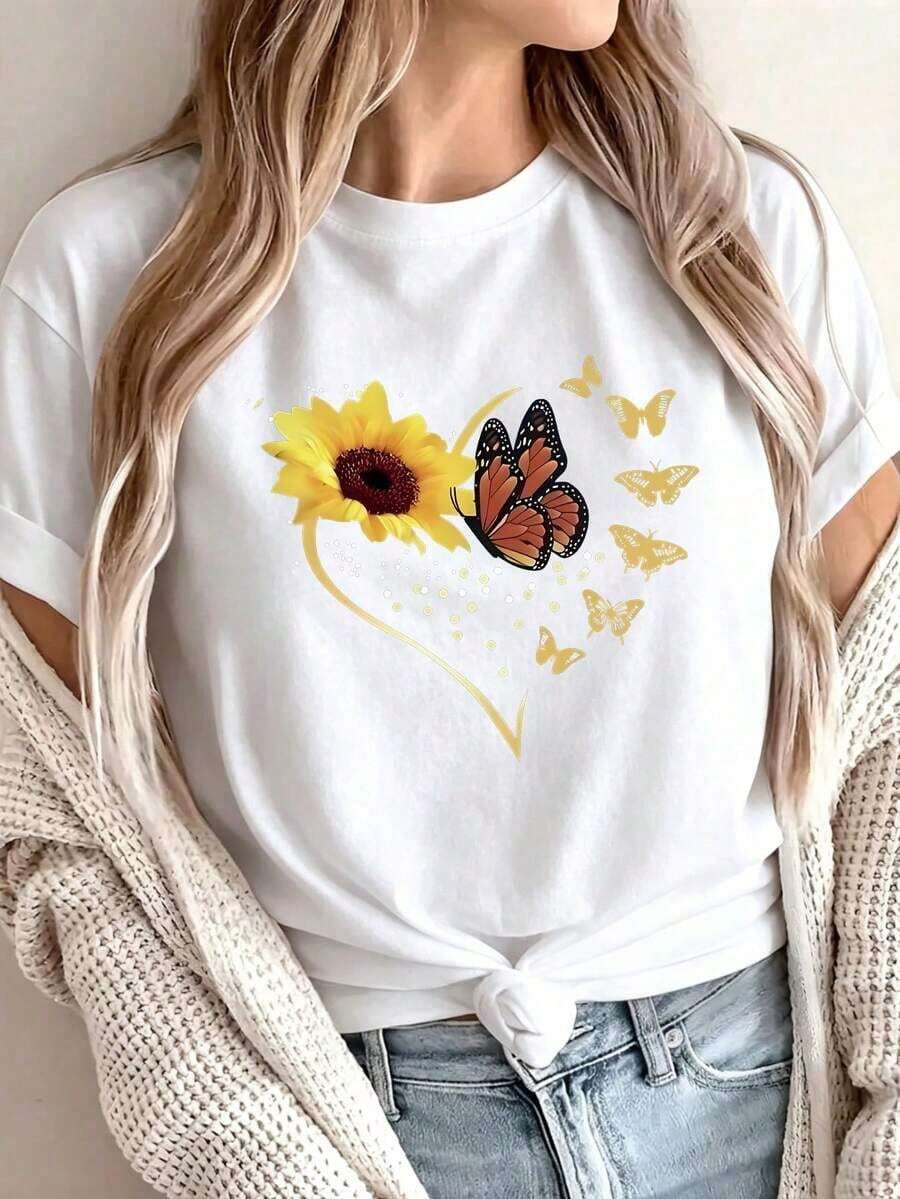 Camisetas estampadas de moda para mujer, tops de estilo urbano de talla grande, camisetas de verano cómodas y elegantes que combinan con todo. Camiseta casual de manga corta con cuello redondo y estampado de girasoles y mariposas en color negro. - Blanco - Ver 1