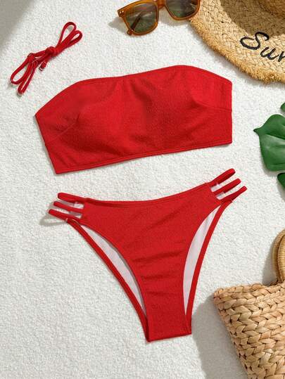 Bộ 2 món bikini dây mảnh màu đỏ có họa tiết, quần bơi cạp cao nhiều dây buộc, có thể tháo rời.
