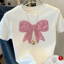 Women's Short-Sleeved T-Shirt With A Stylish Transfer. The Eye-Catching 2D Glitter Bow Print On The Chest Is Very Striking. The Rhinestone-Studded Texture Adds A Touch Of Elegance. The Contrasting Colors Create A Sweet And Feminine Feel. Ideal For Both Dates And Everyday Wear. - 白 - 查看 2