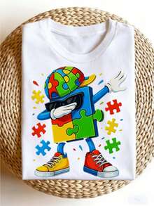 Camiseta de concientización sobre el autismo, con un colorido diseño de rompecabezas y personajes bailando. Este diseño casual de cuello redondo es perfecto para adultos que buscan estampados divertidos, disponible en tallas grandes. - Blanco - Ver 1