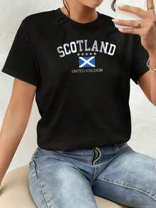 Scottish Flag With The White Cross Symbolizing Courage, Freedom, And National Pride, Accompanied By Gold Stars And The Words United Kingdom, Reflecting The Unity And Strength Of British Identity. Women's 100% Cotton T-Shirt, Comfortable And Modern For Everyday Wear And To Show A Spirit Of Independence. Comfortable Clothing. - 黑色 - 查看 7