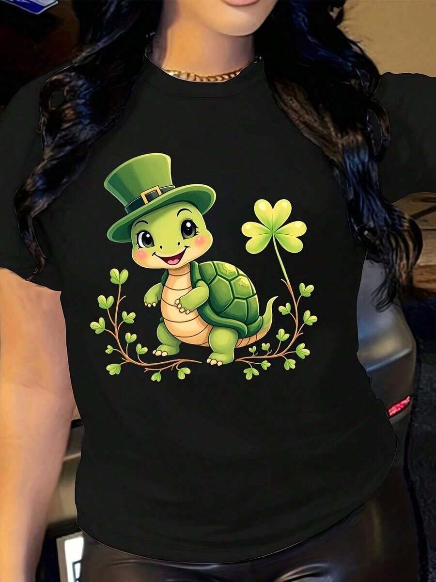 ropa de mujer Camiseta gráfica Y2K para mujer - Camiseta con diseño de tortuga y sombrero de trébol, top casual elástico para atuendos del Día de San Patricio, vestimenta casual, camisas de mujer - Negro - Ver 1