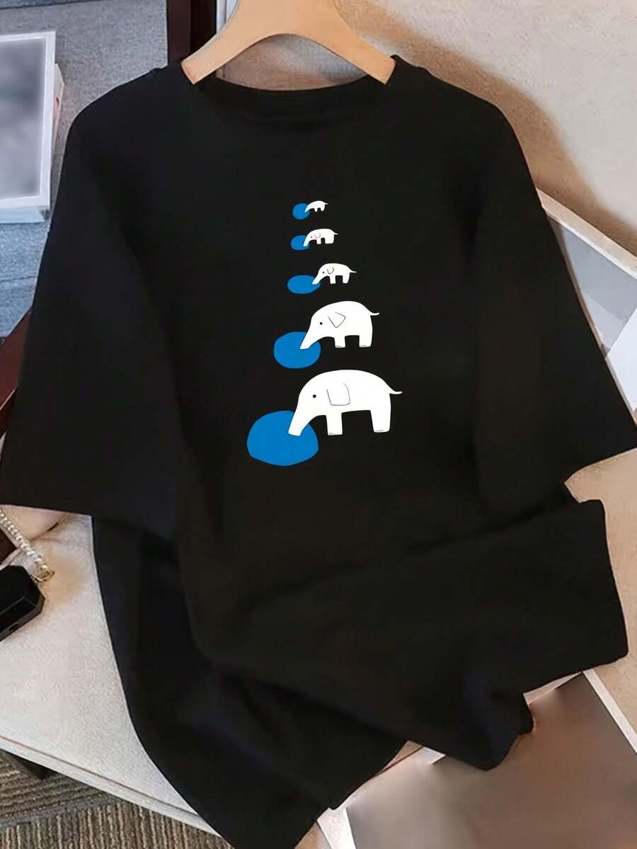 Camiseta Deportiva Casual para Mujer con Diseño de Elefantes Blancos y Colas Azules - Camiseta Negra Elástica de Cuello Redondo, Lavable aáquina, Ajuste Cómodo para Todas las Estaciones, para un Look y Divertido. - Negro - Ver 1