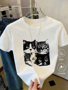 Camiseta de manga corta de algodón para mujer con estampado de gato adorable, top informal de cuello redondo con tejido semitransparente para el día a día. - Negro - Ver 7
