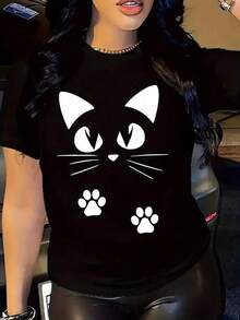 Camiseta negra con diseño de gato minimalista y huellitas en un estilo y2k perfecta para amantes de los felinos y la moda juvenil ideal para cualquier ocasión combina comodidad y estilo a la última  en México disponible en tallas únicas. Cómoda y versátil para escuela, trabajo, salidas y eventos casuales - Negro - Ver 1