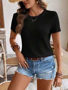 Camiseta de verano para mujer con cuello redondo de unicolor, manga corta y tela texturizada para uso casual - Negro - Ver 1