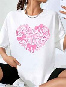 Camiseta Oversize con Patrón de Lazos y Corazones GraphicHeart para Mujer, Corte Holgado Casual, Blanca con Lazos Rosados y Diseño de Corazones, Perfecta para el Día de San Valentín y Uso Diario. - Blanco - Ver 1