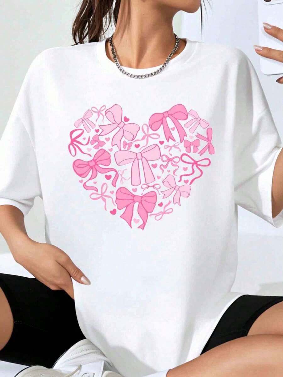 Camiseta Oversize con Patrón de Lazos y Corazones GraphicHeart para Mujer, Corte Holgado Casual, Blanca con Lazos Rosados y Diseño de Corazones, Perfecta para el Día de San Valentín y Uso Diario. - Blanco - Ver 1