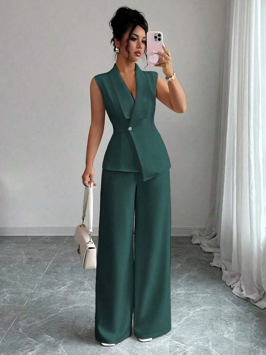 Conjunto de oficina elegante para mujer, compuesto por una chaqueta blazer sin mangas con cuello y bajo asimétrico, con hebilla metálica en la cintura, combinada con pantalones de cintura elástica.Conjunto de 2 piezas elegante para primavera/verano, atuendo formal y de clase para mujer. - Verde Oscuro - Ver 1