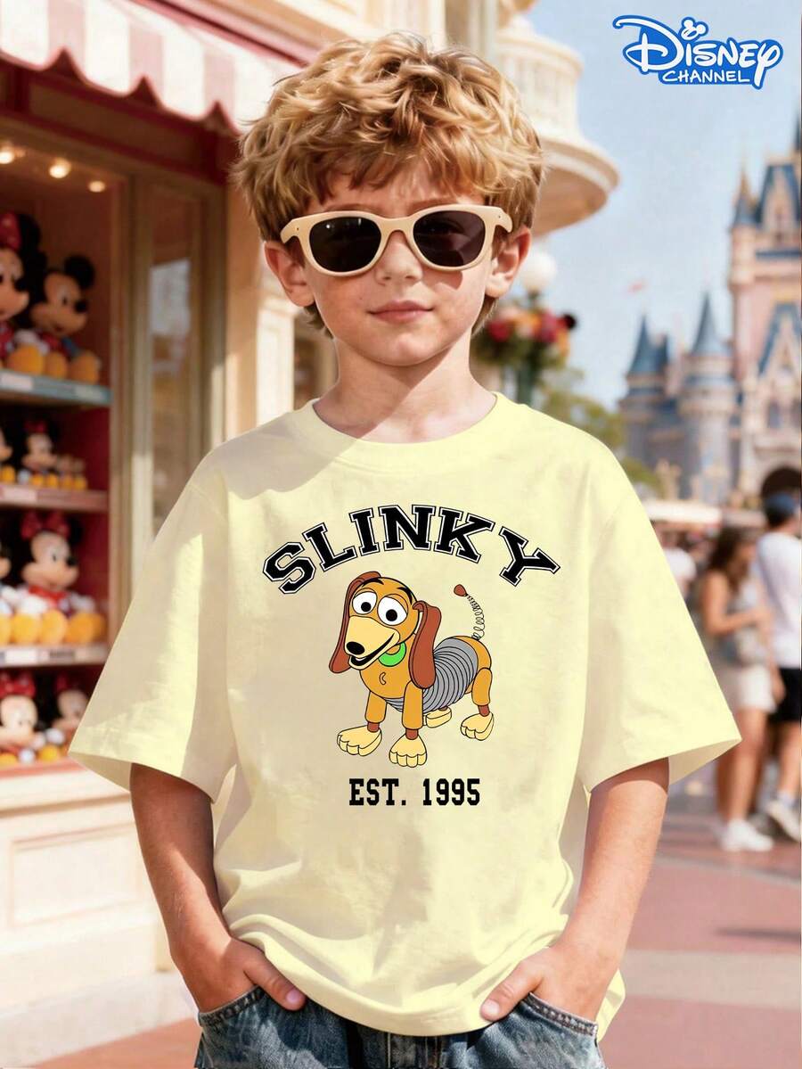 Disney Toy Story Slinky Dog Print Children's T-Shirt, Apricot Loose Round Neck Top, Featuring The Slinky Dog Image With The "Slinky" And 1995 Logo, Full Of Playful And Cool Atmosphere, Breathable And Skin Friendly, Suitable For Summer Parks And Streets, Suitable For Both Men And Women - Màu be - Xem 1