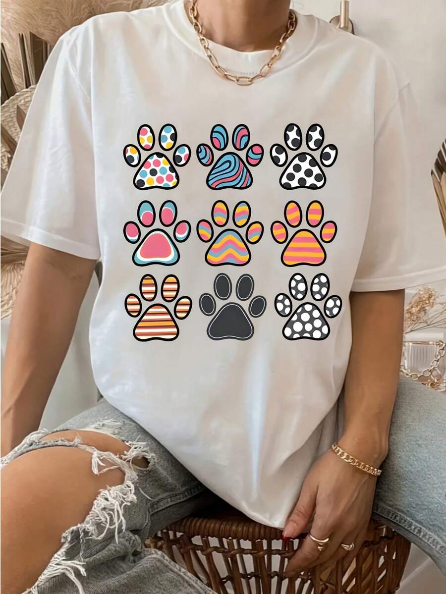 Camiseta Deportiva Casual para Mujer de Color Blanco con Coloridos Diseños de Huellas de Patas - Camiseta Elástica de Cuello Redondo, Lavable aáquina, Ajuste Cómodo y Perfecta para Todas las Estaciones. - Blanco - Ver 1