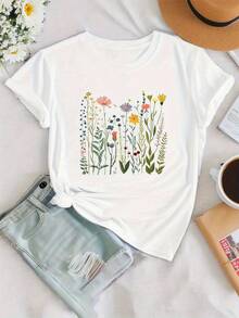 Soft, Breathable, And Lightweight For All-Day Comfort. This Short-Sleeved T-Shirt Features A Wildflower Print And A Crew Neck, Making It A Casual Piece For Women In Spring And Summer. The Classic Neckline And Relaxed Fit Flatter All Body Types And Are Easy To Pair With Jeans, Shorts, And Leggings. - 白色 - 查看 1