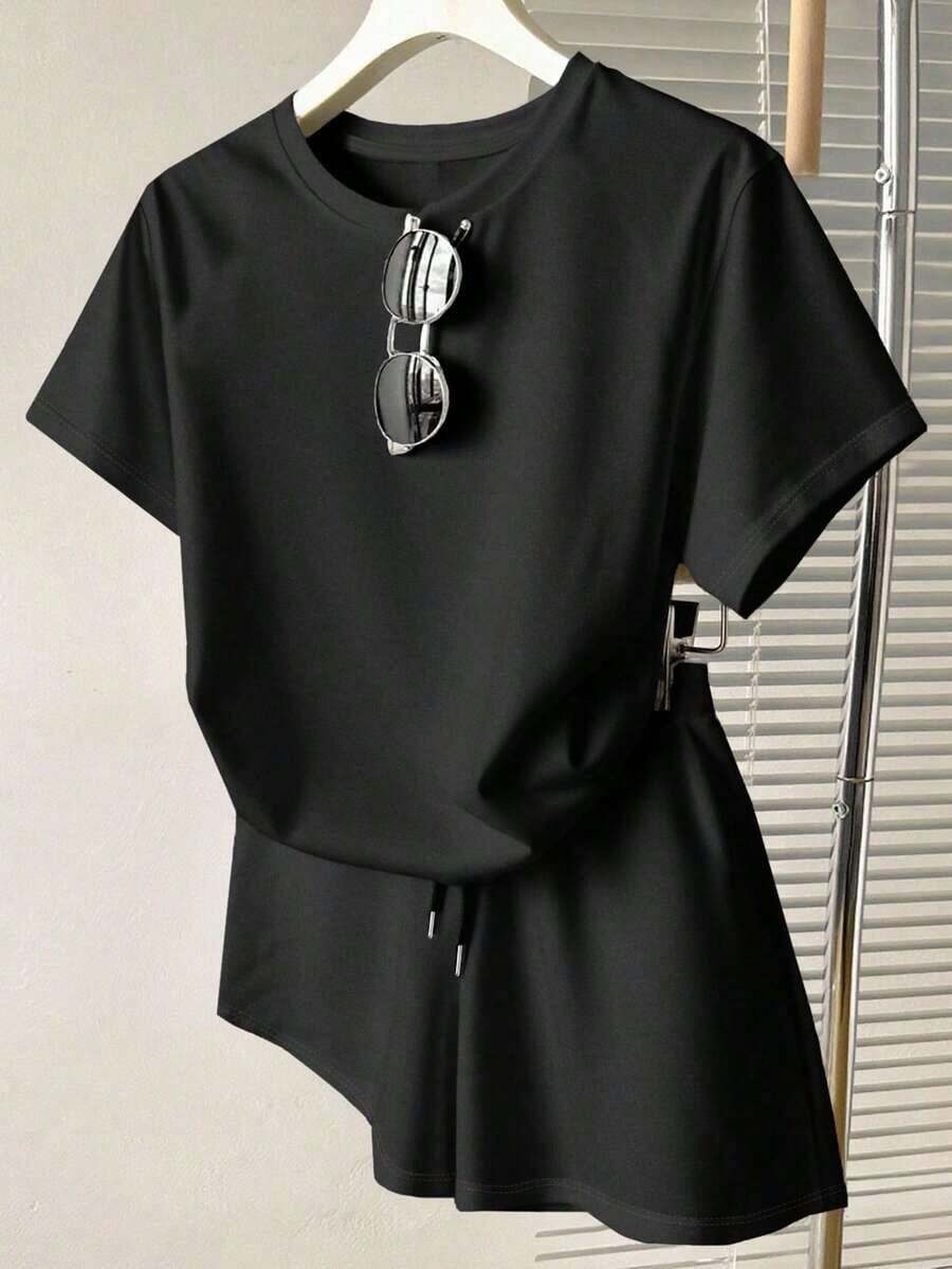 Conjunto casual diario de top de manga corta de cuello redondo de unicolor y shorts con cordón en la cintura para mujer - Negro - Ver 1