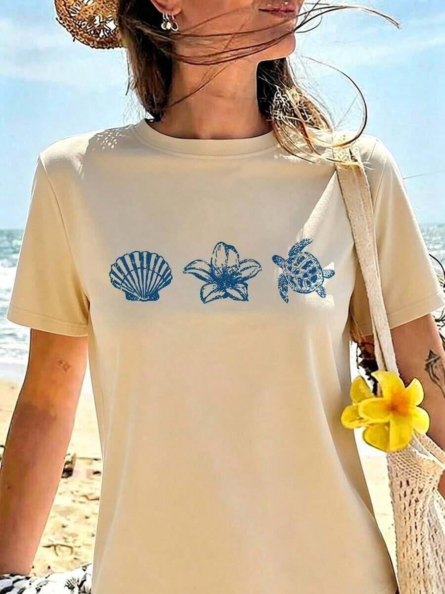 Camiseta de manga corta azul claro para mujer, estilo casual de verano, con estampado de letras, animales marinos, tortugas, conchas y flores, corte holgado, cuello redondo, a la moda para uso diario y vacaciones, color blanco. - Albaricoque 2 - Ver 1