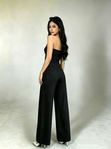 Set de 2 piezas para mujer: Top de manga corta con hombros descubiertos y pantalón campana de pierna ancha de unicolor - Negro - Ver 2