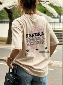 Camiseta Casual para Mujer 2026 con Estampado Gráfico de Sakura Blanca, Manga Corta con Hombros Caídos, Cuello Redondo, Tejido de Punto de Elasticidad Media para Moda de Primavera, 100% Algodón - Albaricoque - Ver 2