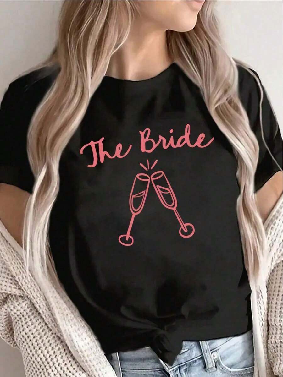 Soft, Breathable, And Lightweight For All-Day Comfort. This Lightweight Yet Durable Short-Sleeve T-Shirt Features A Bridal Design With Pink Champagne Glasses, Perfect For Weddings, Bridal Wear, And Also A Great Choice For Bachelorette Parties And Receptions. The Classic Crew Neck And Relaxed Fit Flatter All Body Types And Are Easy To Pair With Jeans, Shorts, And Leggings. - 黑色 - 查看 1