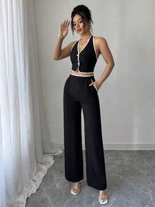 Set de 2 piezas para mujer: Top halter de cuello con recorte de contraste y espalda descubierta, y pantalones con bolsillo - Negro - Ver 4